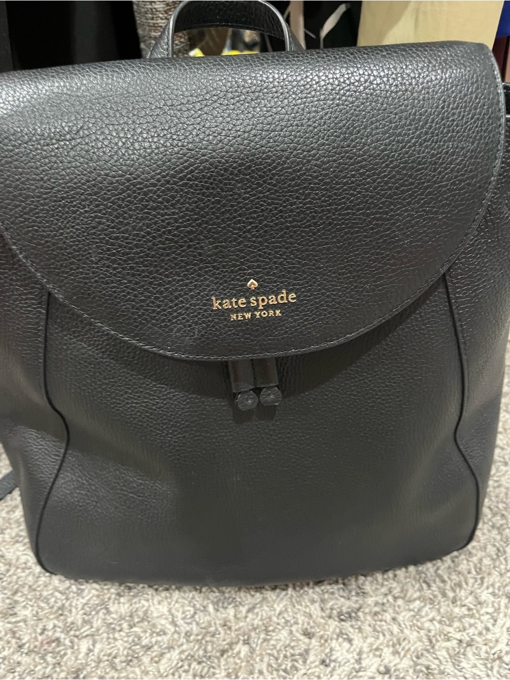 kate spade black pebbled leather backpack with gold logo accent